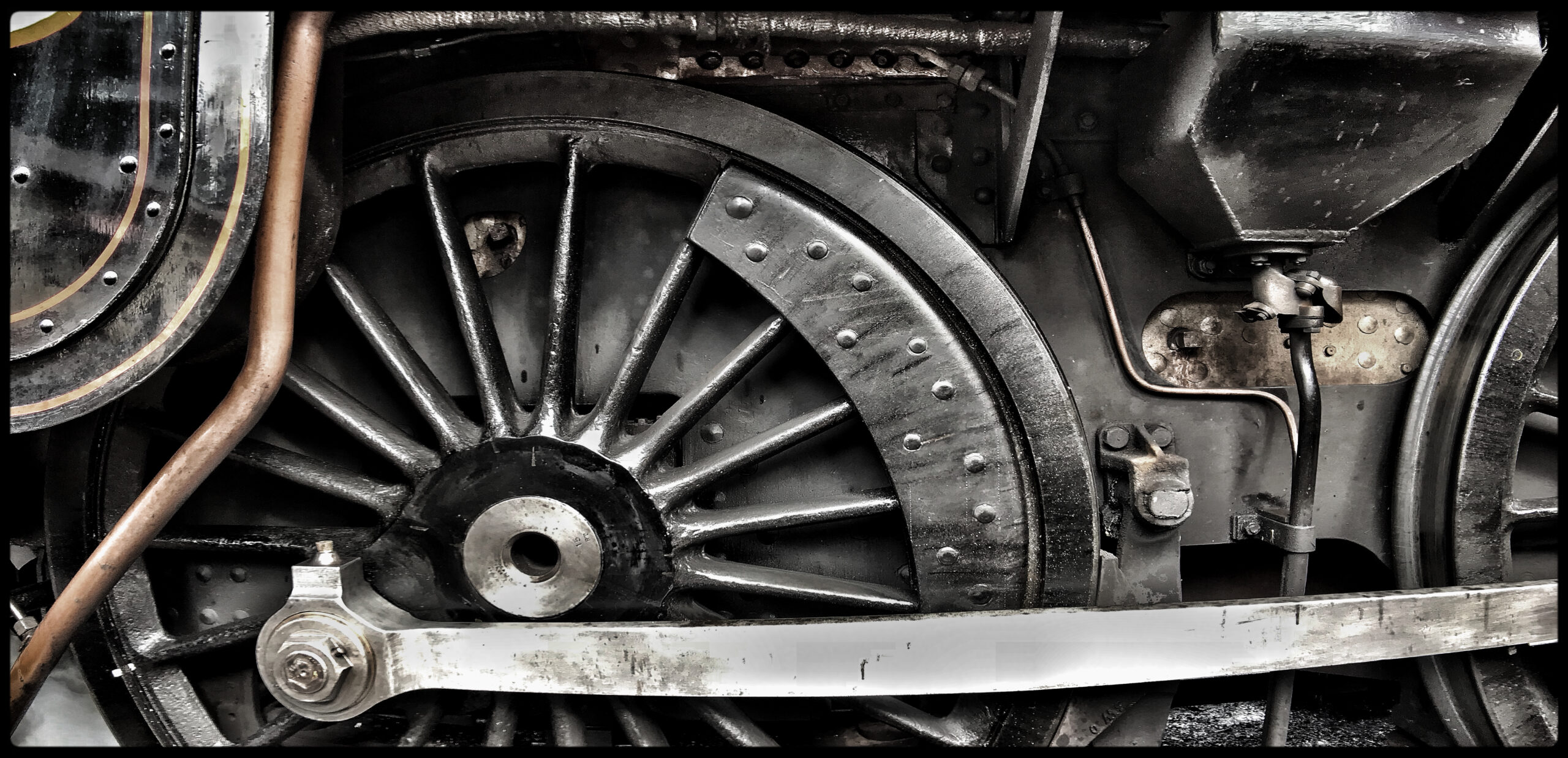 The business end of a steam locomotive on the North Yorkshire steam railway .